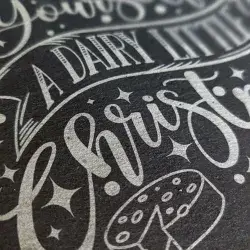 Have yourself a dairy little Christmas engraved on slate closed up.