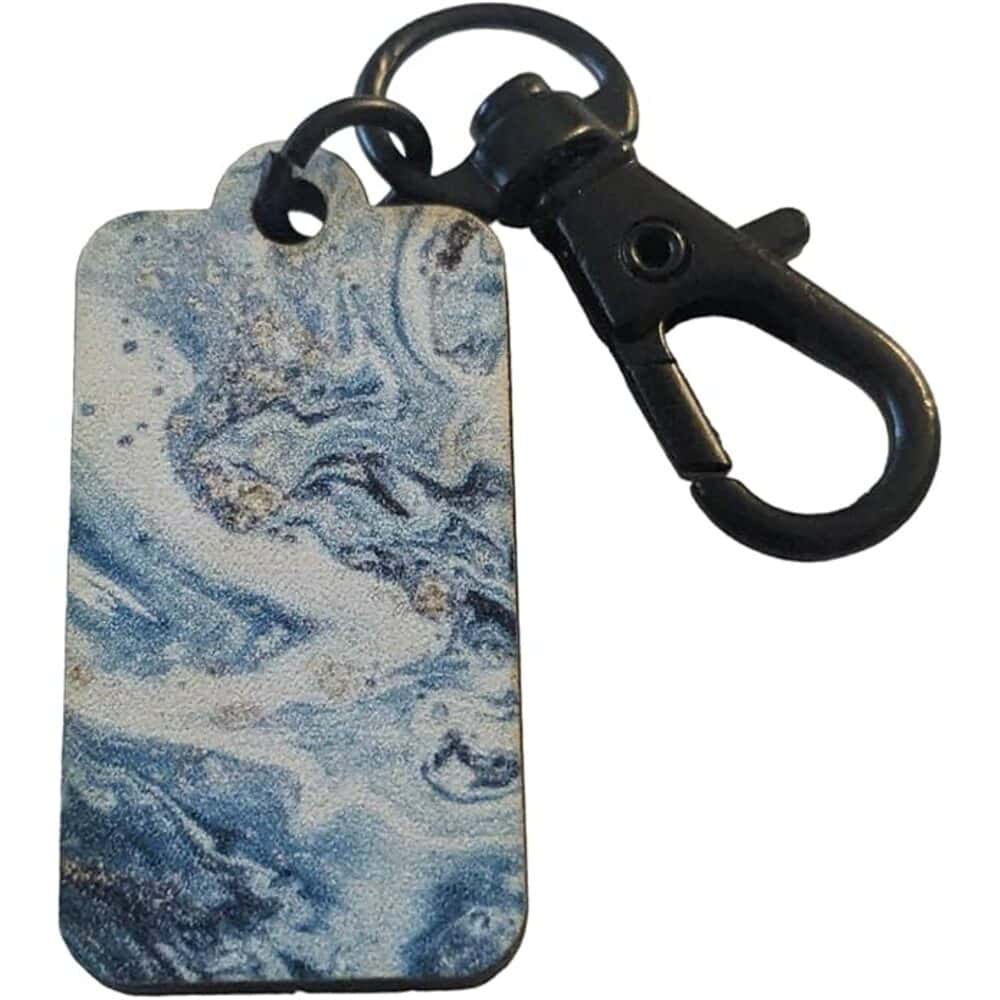 Marbled dog ID tag with black metal clasp, custom pet accessory, durable and stylish.