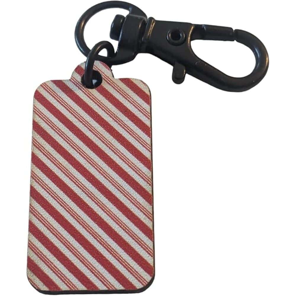 Red and white striped luggage tag with black swivel clasp for travel identification.
