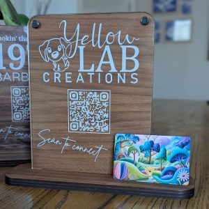 Wooden sign displaying QR code for connection
